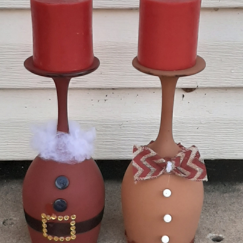Santa claus and gingerbread candle holders